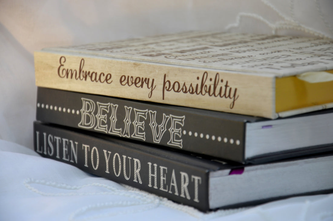 A stack of inspirational journals.
